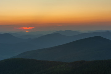 Beautiful summer in the Carpathian Mountains with tourists in tents with beautiful views ..
