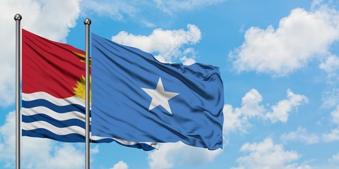 Kiribati and Somalia flag waving in the wind against white cloudy blue sky together. Diplomacy concept, international relations.