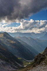 Fototapeta premium Wonderful views of the mountains in the Swiss Alps with backpackers. 