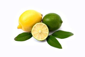 Lime and limon on a white background. Whole and halves limes isolated on white background. Yellow lemon with lime on isolated background. Full depth of field.