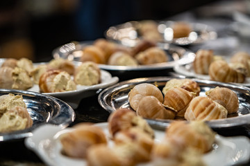 cooked snails with cream sauce