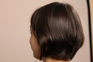 Woman with bob haircut back view