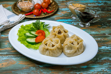 Mongolian buuz on wooden table