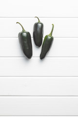 Green jalapeno peppers.