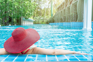 Woman enjoy relaxing in the pool