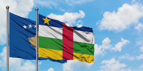 Kosovo and Central African Republic flag waving in the wind against white cloudy blue sky together. Diplomacy concept, international relations.