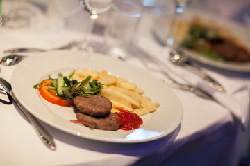 Grilled steak with french fries potato, tomato and ketchup