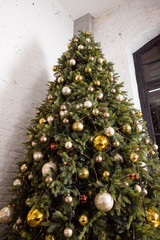 Low Angle View of a Giant Sparkling Christmas Tree Decorated with many Colorful and Shiny Ornaments.Christmas Festival.ornament decorations,Christmas and New year concept