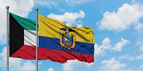 Kuwait and Ecuador flag waving in the wind against white cloudy blue sky together. Diplomacy concept, international relations.