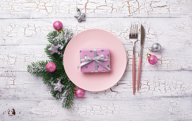 Christmas table setting in pink color