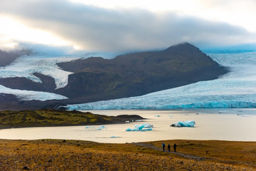Glacier and icebergs in Fjallsarlon Glacial Lagoon, Iceland. Great tourist attraction