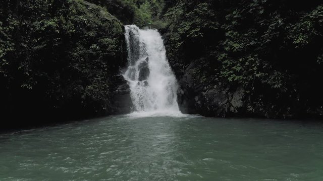 Waterfall in Bali Island tropical mountains 4K Drone flight