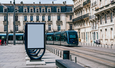 Line of clear billboards on city street with blank copy space screen for advertising or promotional poster content, empty mockup Lightboxes for information, blank displays outdoors in urban area © BullRun