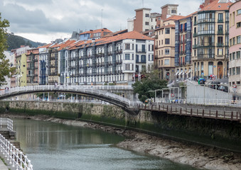 City landscape with a Nevion River, Bridge and promenade, Bilbao, Spain.