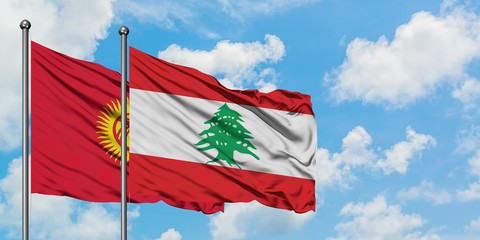 Kyrgyzstan and Lebanon flag waving in the wind against white cloudy blue sky together. Diplomacy concept, international relations.