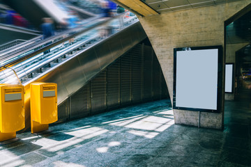 Clear Billboard in public place with blank copy space screen for advertising or promotional poster content, empty mock up Lightbox for information, blank display in station area with daylight © BullRun