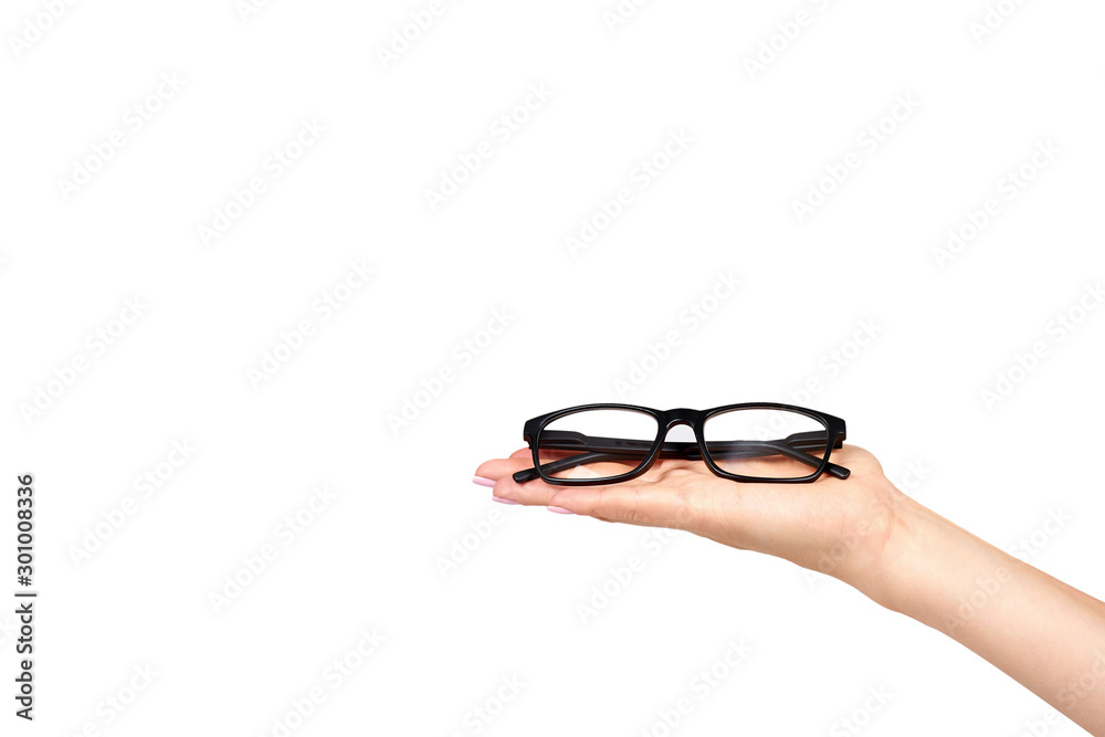 Canvas Prints hand with black eyeglasses, eye optic correction tool.