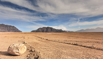 Afghanistan landscape, desert plain against the backdrop of mountains - obrazy, fototapety, plakaty