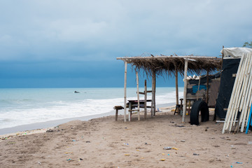 beach with chairs and umbrellas