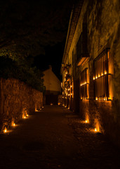 Fototapeta na wymiar Street decorated with candles in the night of the candles, Pedraza, Segovia, Spain