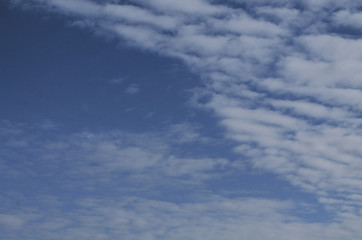 Light white air clouds against the blue sky.