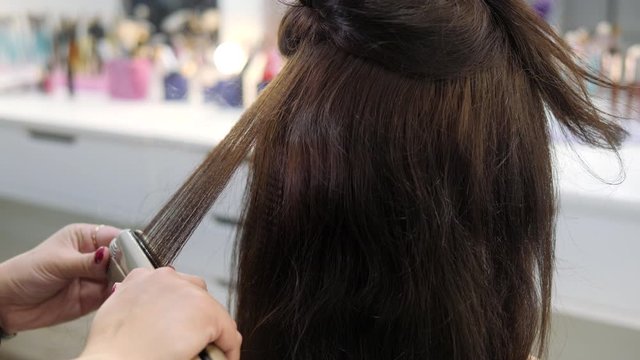 Hair care. Heat treatment treatment of hair strands.