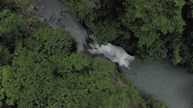 Waterfall in Bali Island tropical mountains 4K Drone flight