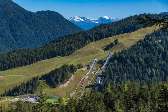 view of mountains in the alps with ski-jump facility, seefeld, tyrol