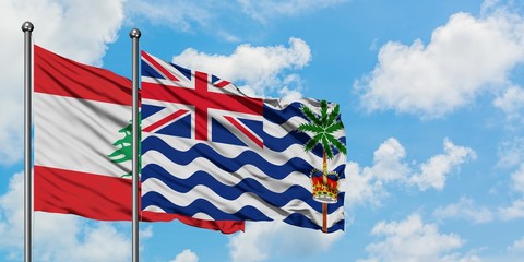 Lebanon and British Indian Ocean Territory flag waving in the wind against white cloudy blue sky together. Diplomacy concept, international relations.