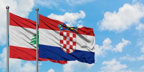 Lebanon and Croatia flag waving in the wind against white cloudy blue sky together. Diplomacy concept, international relations.