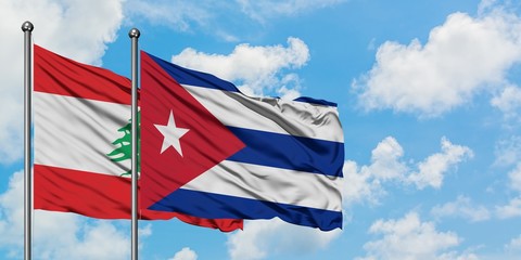 Lebanon and Cuba flag waving in the wind against white cloudy blue sky together. Diplomacy concept, international relations.