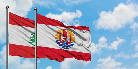 Lebanon and French Polynesia flag waving in the wind against white cloudy blue sky together. Diplomacy concept, international relations.