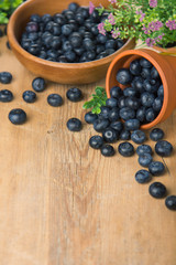 Blueberry on wooden table background. Blueberries closeup. Berries closeup