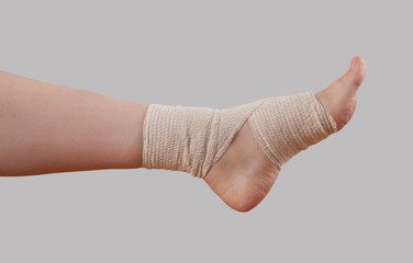 hand with adhesive bandage isolated on white