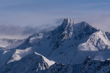 Fototapeta na wymiar Mountain peak in the mountains. View over the Alps, from Kaunertal Glacier area, in Tyrol, Austria.