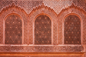 detail of the decorated windows at Ben Youssef Madrasa in Marrakesh, morocco
