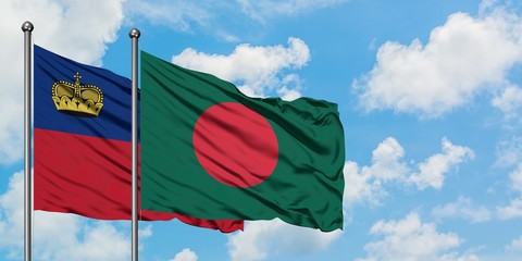 Liechtenstein and Bangladesh flag waving in the wind against white cloudy blue sky together. Diplomacy concept, international relations.