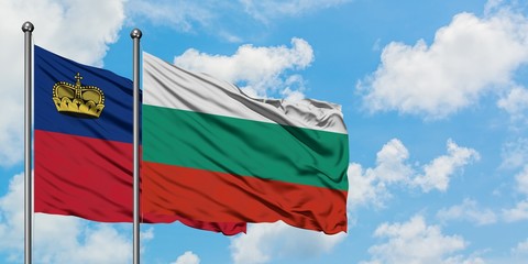 Liechtenstein and Bulgaria flag waving in the wind against white cloudy blue sky together. Diplomacy concept, international relations.