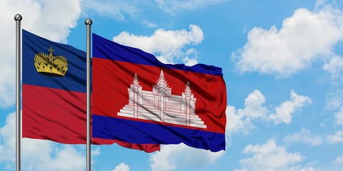 Liechtenstein and Cambodia flag waving in the wind against white cloudy blue sky together. Diplomacy concept, international relations.