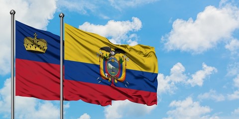 Liechtenstein and Ecuador flag waving in the wind against white cloudy blue sky together. Diplomacy concept, international relations.