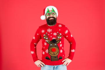 Sweater with deer. Clothes shop. Buy festive clothing. Holidays accessories. Hipster bearded man...