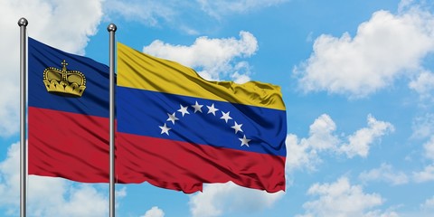 Liechtenstein and Venezuela flag waving in the wind against white cloudy blue sky together. Diplomacy concept, international relations.