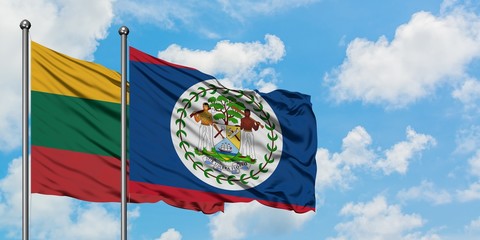 Lithuania and Belize flag waving in the wind against white cloudy blue sky together. Diplomacy concept, international relations.