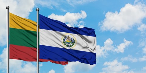 Lithuania and El Salvador flag waving in the wind against white cloudy blue sky together. Diplomacy concept, international relations.