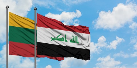 Lithuania and Iraq flag waving in the wind against white cloudy blue sky together. Diplomacy concept, international relations.