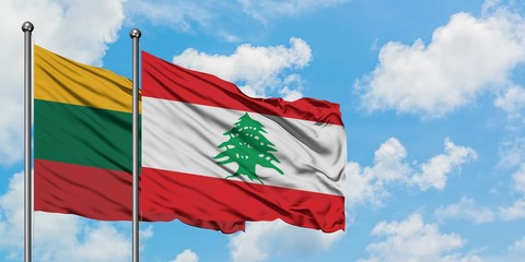 Lithuania and Lebanon flag waving in the wind against white cloudy blue sky together. Diplomacy concept, international relations.
