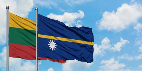 Lithuania and Nauru flag waving in the wind against white cloudy blue sky together. Diplomacy concept, international relations.