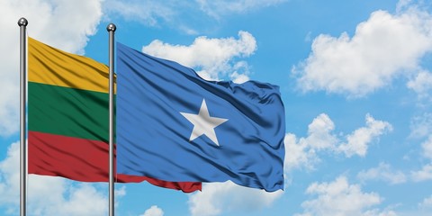 Lithuania and Somalia flag waving in the wind against white cloudy blue sky together. Diplomacy concept, international relations.
