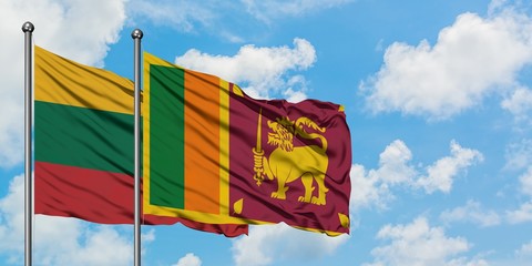 Lithuania and Sri Lanka flag waving in the wind against white cloudy blue sky together. Diplomacy concept, international relations.