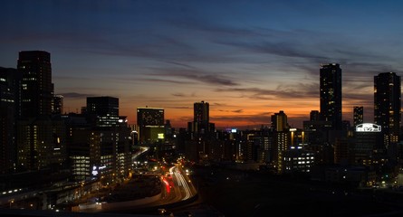 Obraz na płótnie Canvas Sunset over Osaka city, Japan.